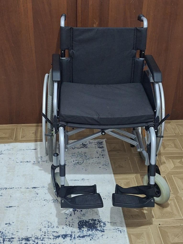 Инвалидная коляска