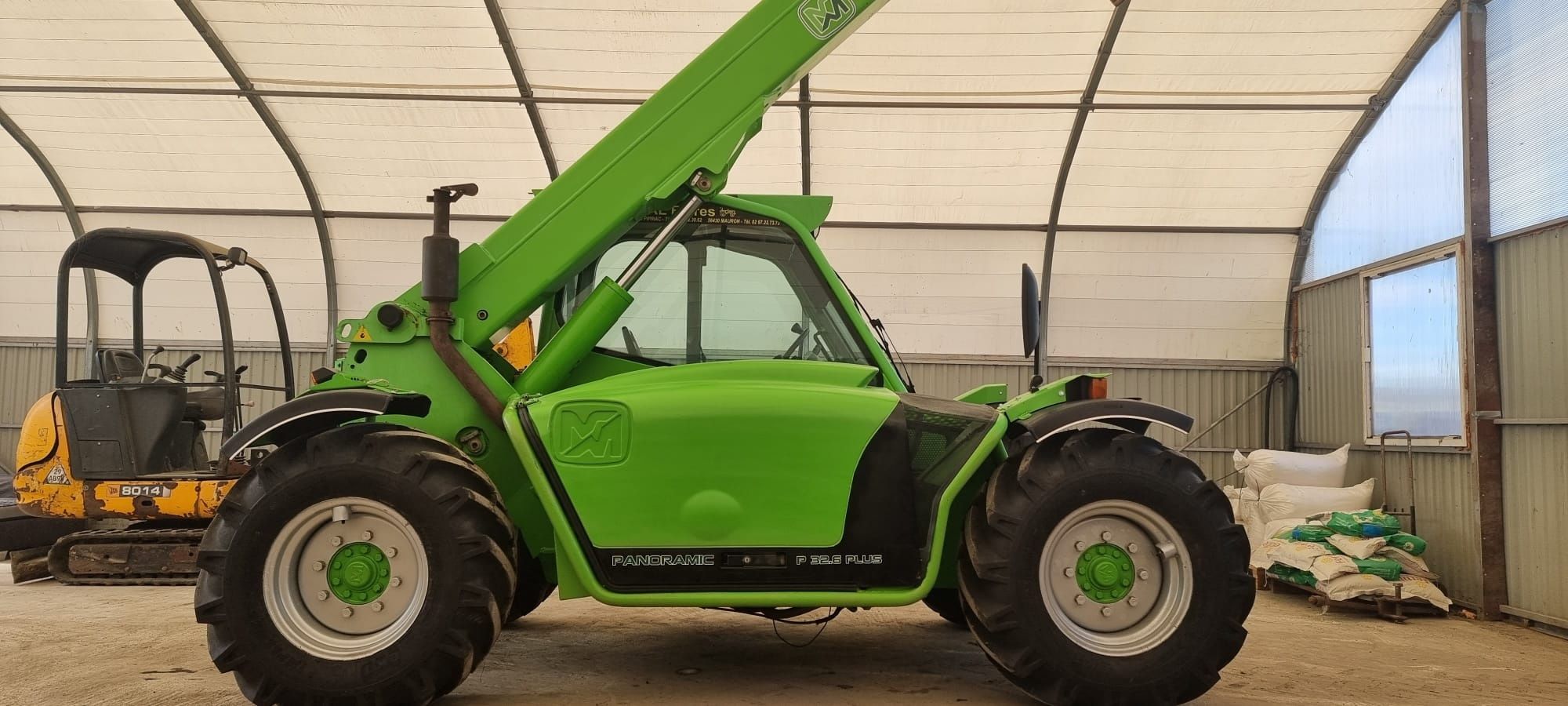 Vând incarcator  Merlo P 32.6