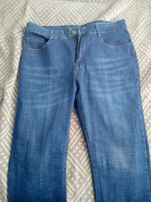 Новые синие джинсы