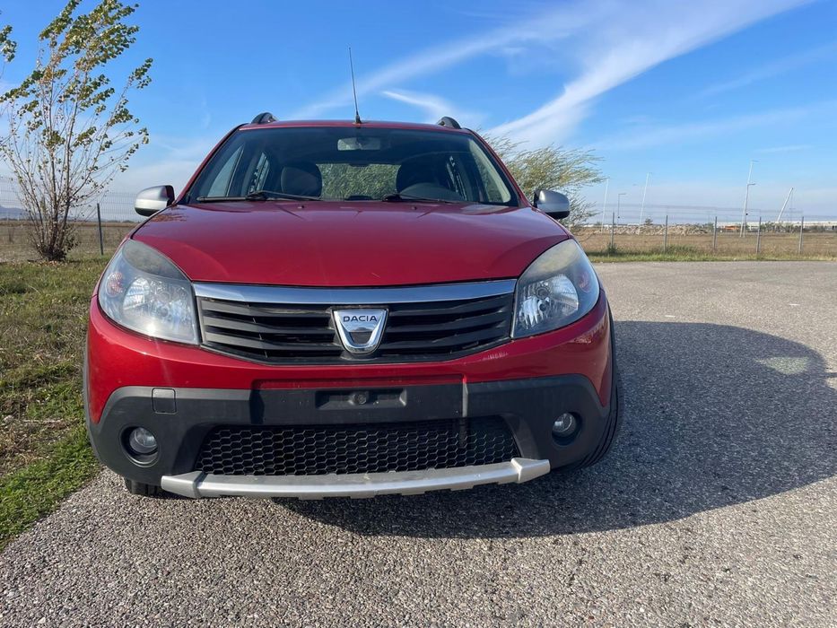 Dacia Sandero 1.6 benzină 2011 Ac 212000 km rosie cutie manuala 84 cp