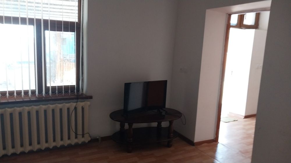 Шанхайда времянка бар екі бөлмелі