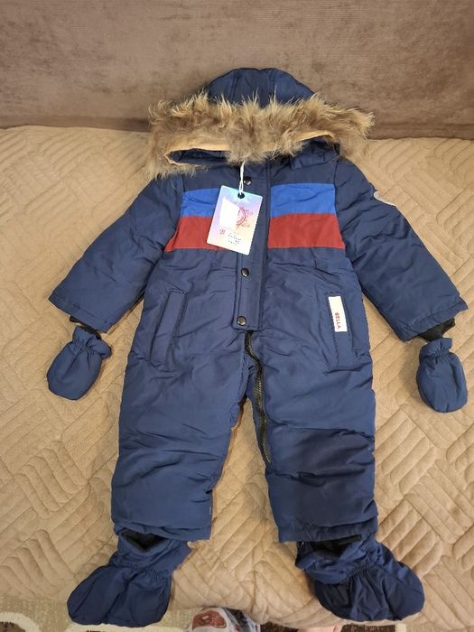 Продам детские новые комбинезоны зима/осень