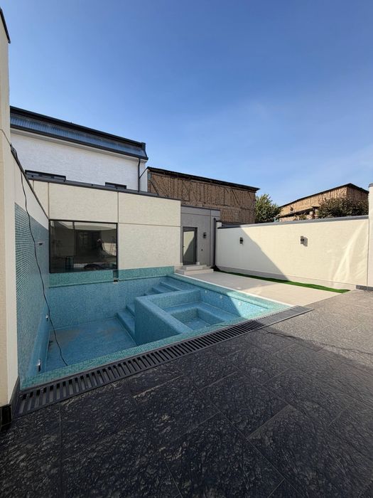 Мирзоулугбек район 3,2 сотки новый дом с бассейном