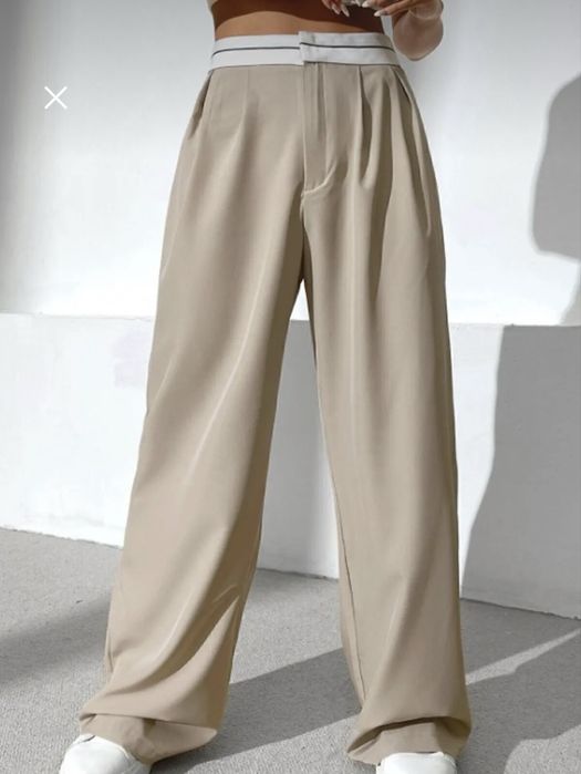 Vand pantaloni eleganti