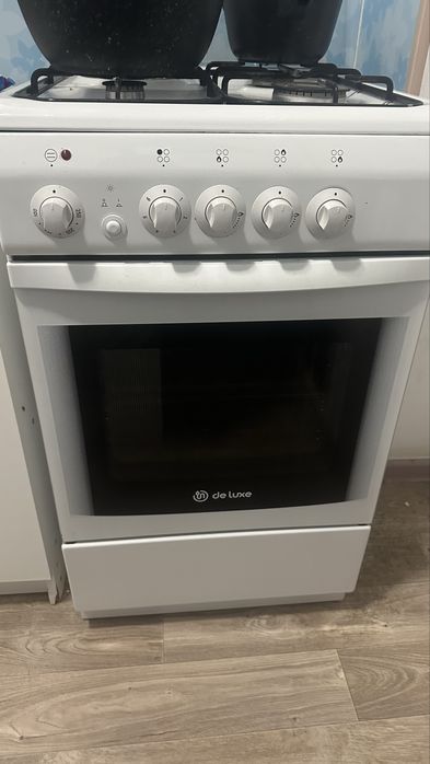 Газовая плита с духовкай