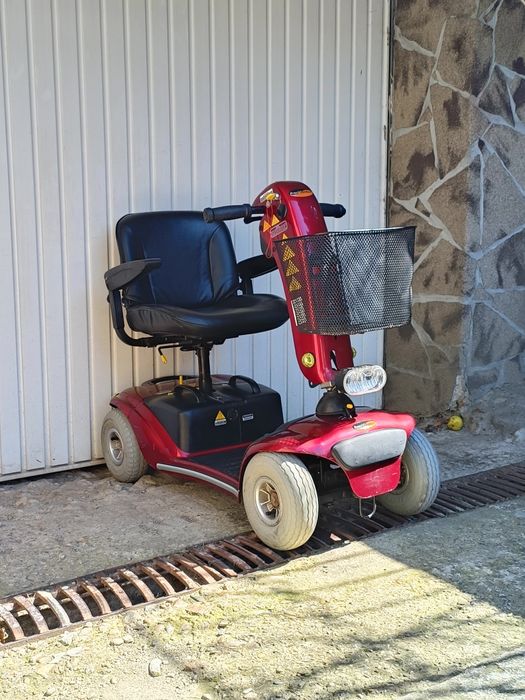 Carucior electric scuter handicap tricicleta batrani carut dizabilitat