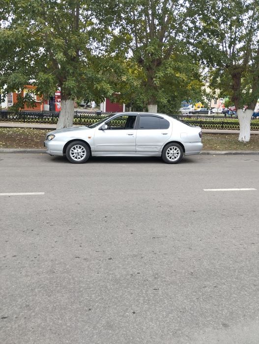 Нисан примьера р11