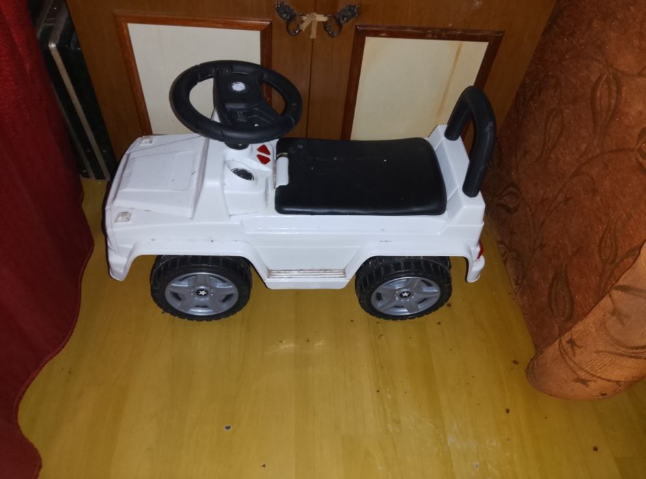 Толокар детский с музыкой 4 песни)не дорого