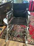 Scaun de invalid cu rotile