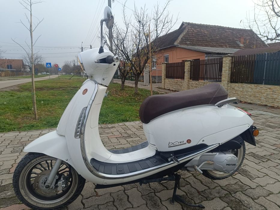 Scuter 125cc     .