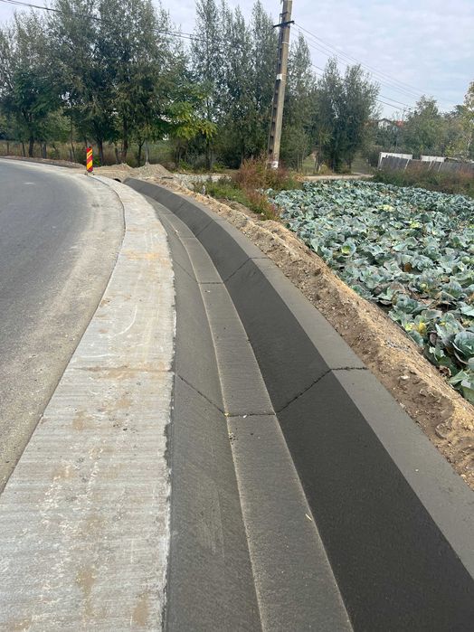 Santuri si rigole betonate  rigole de acostament realizate mecanizat