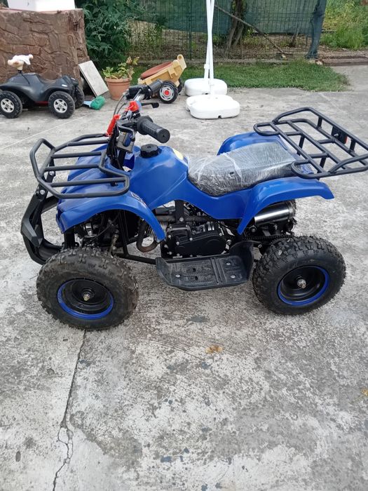 Vand ATV de copii pe benzina motor 49 cc , aproape nou. Pret 2000 lei