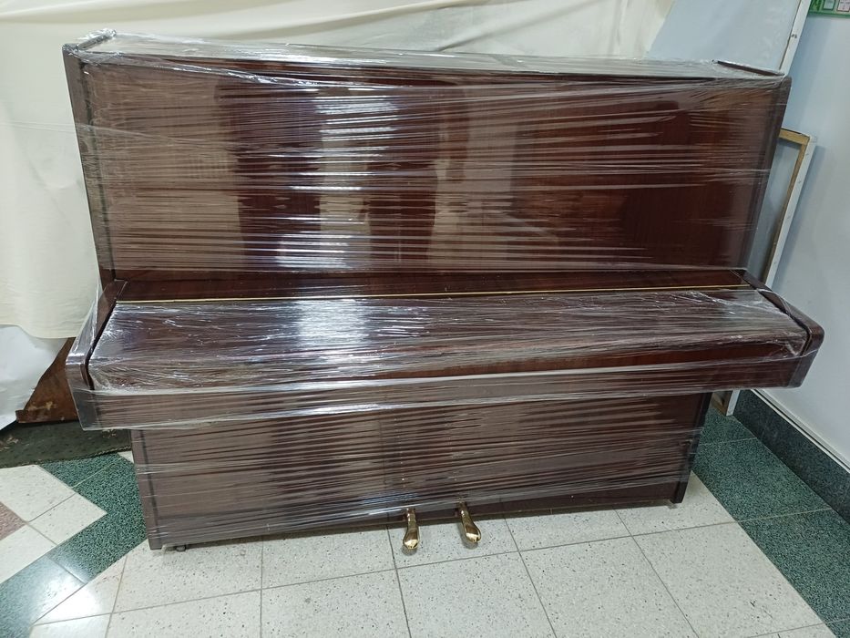 Yangi Belarus pianino