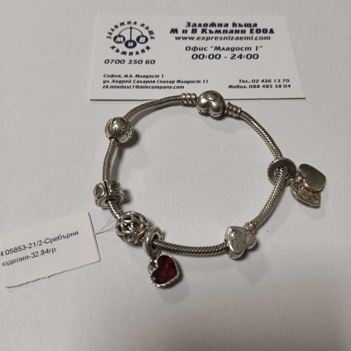 Сребърна гривна Pandora с шест талисмана 32.84гр.