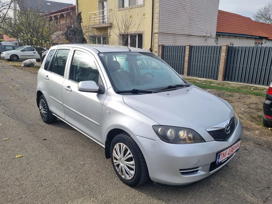 Mazda 2 Mazda 2 motor 1.4 benzina an 2006 cutie de viteze