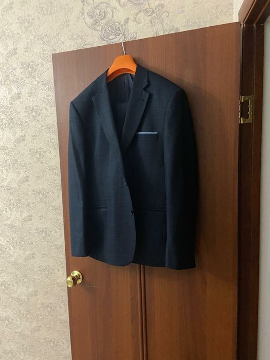 Новый костюм цена 50 000