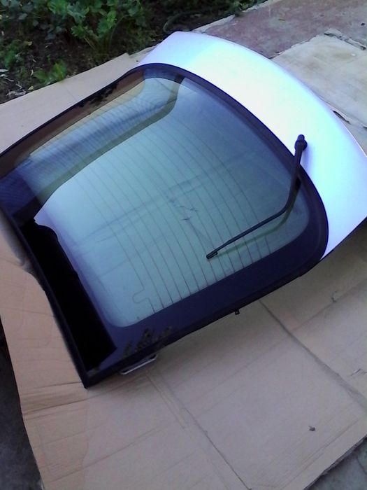 Haion luneta Renault Laguna,inchidere elect.,motoras stergator,brat..