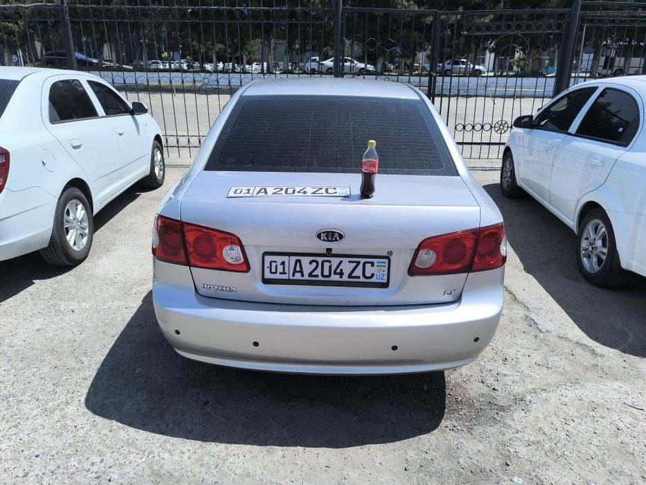 Kia Optima sotiladi gaz metan benzin