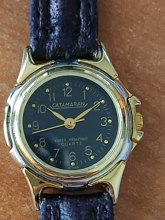 ceas Catmaran aur 18 k water resist swiss quartz