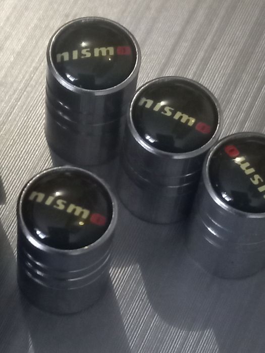 Nissan - set 4 capace pentru jante