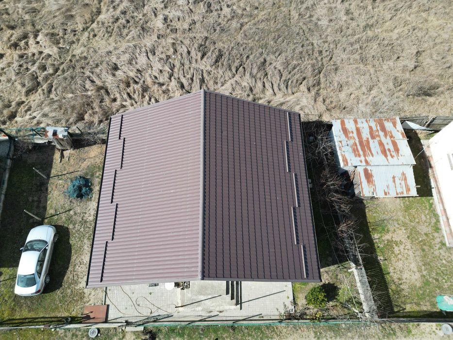 Casa la rosu - Brestei