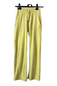 Pantaloni Juicy Couture de catifea cu buzunare la spate