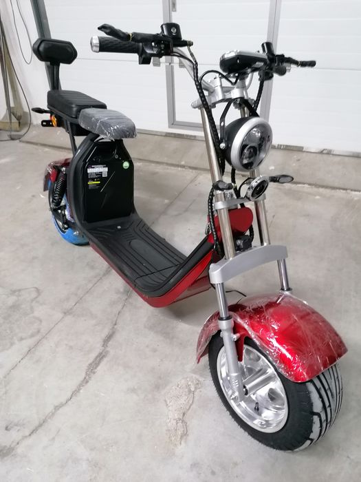 Scuter electric nou de la Societate Comerciala
