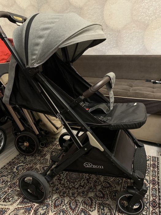 Продам детскую коляску чемодан Boyi
