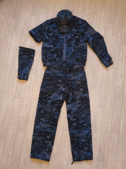 Шапка новая. Комуфляж б/у.