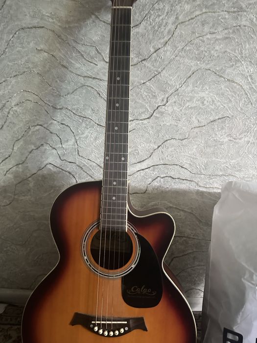 Продам гитару Calao (акустика) новая.