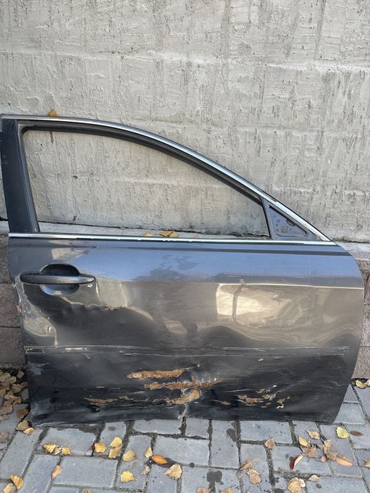 Передний дверь от тайота камри 40