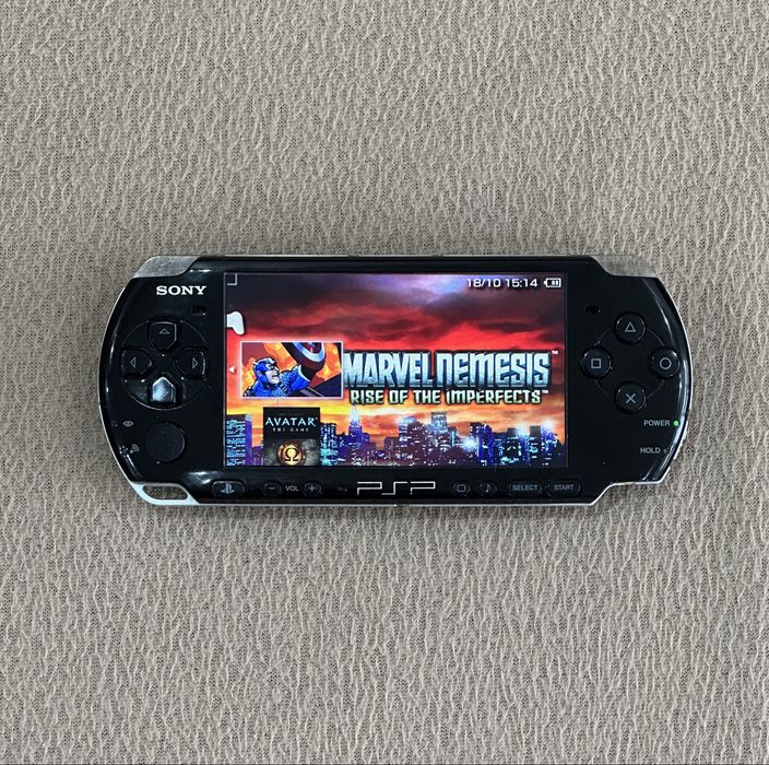 Sony PSP 3004 + нова батерия + кабел за зареждане + 28 игри