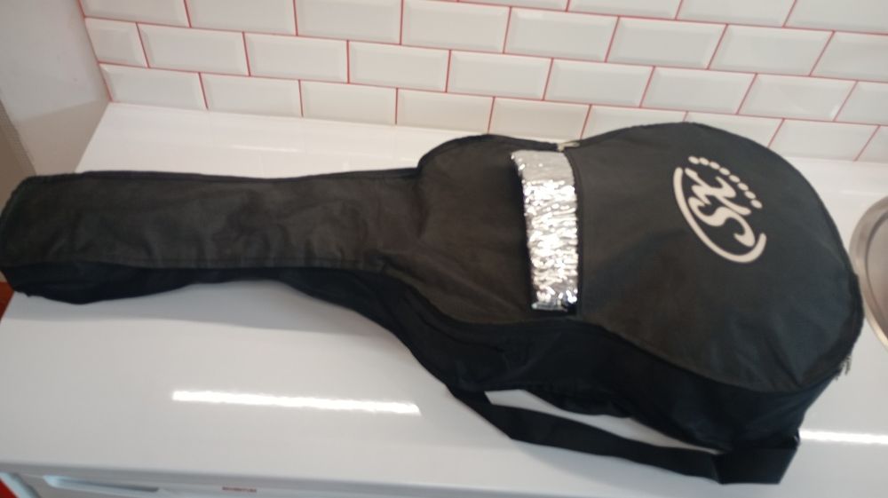 SX китара с допълнителни струни, клип тунер, капо и калъф за китара