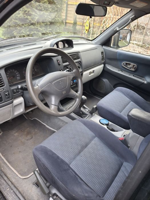 Мицубиши паджеро спорт