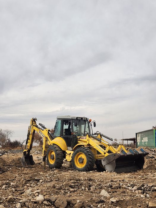 New holland lb115b равноколесный