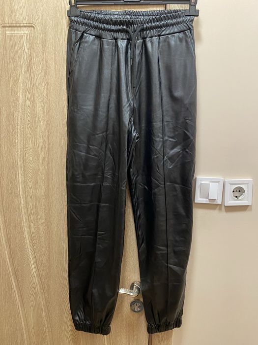 Дамски дънки/черен кожен панталон