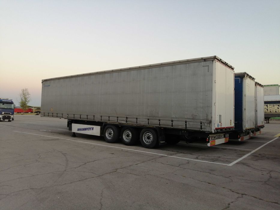 Полуремарке Krone Profi Liner 2014,стандартно,тристранна щора