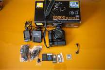Nikon D5200 + Grip + 2 Acumulatori + Telecomenzi + Accesorii