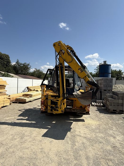 Buldoexcavator Caterpillar 428B 4x4 cu blocanti si 3 cupe