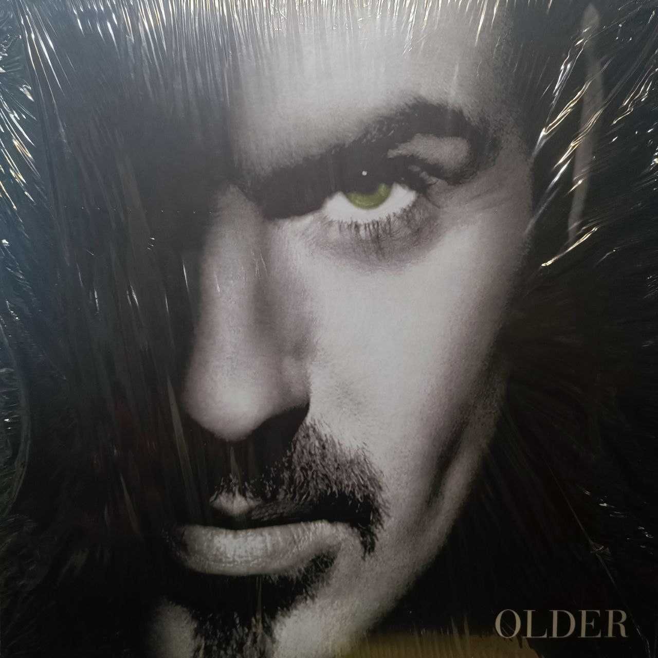 Пластинки Doors, Beatles, George Michael