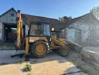 Vand buldoexcavator ford 550