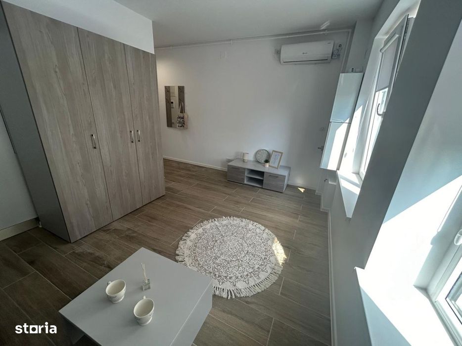 Garsoniera open space intima, etaj 9, cu balcon