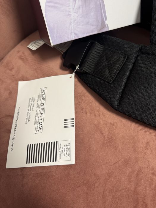 Momcozy Ергономична раница за бебета.