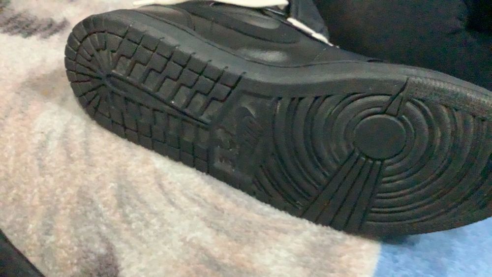 Jordan Triple Black Leather Mid