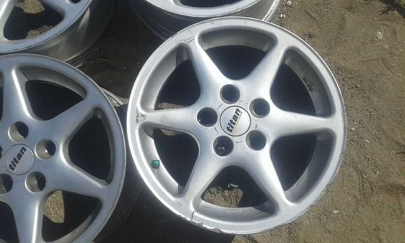 Продам оригинальные легкосплавные диски "Titan" на BMW .