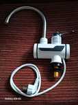 Vând încălzitor electric instant este foarte puțin folosit aproape nou