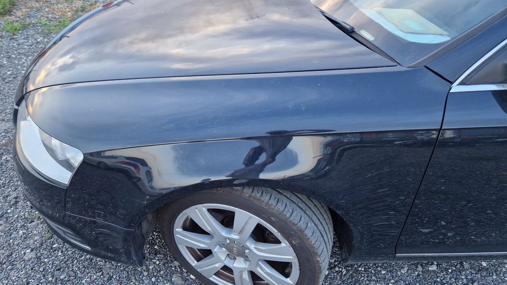 Aripa stanga dreapta Audi A6 C6 2010 (originale, negru)