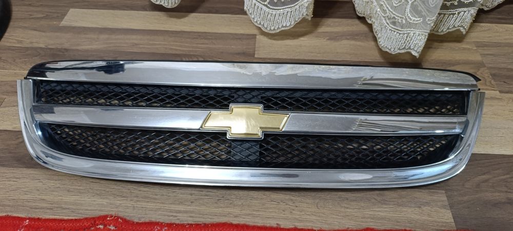 Ласетти облицо́вка