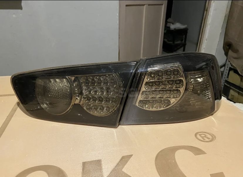 Задние фонари лансер 10