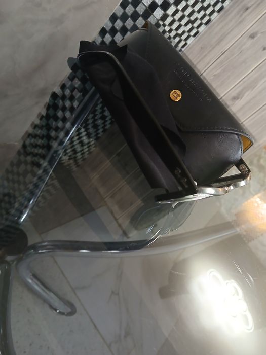 Ochelari rayban firma